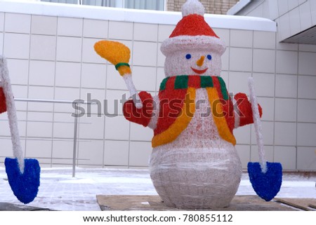 Hot Christmas holiday wicker snowman with Santa hat