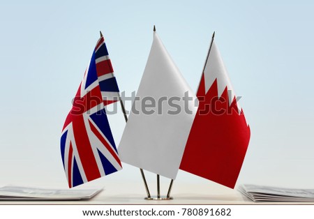Flags of United Kingdom of Great
Britain and Bahrain with a white flag in the middle