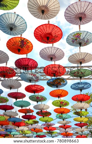 Group of colorful umbrellas on street