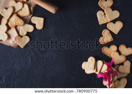 Cookies shape of heart on blak table