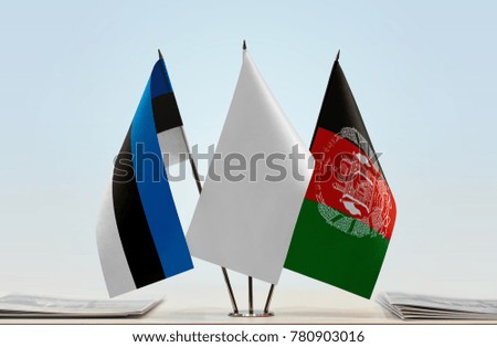 Flags of Estonia and Afghanistan with a white flag in the middle