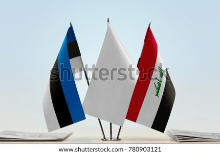 Flags of Estonia and Iraq with a white flag in the middle