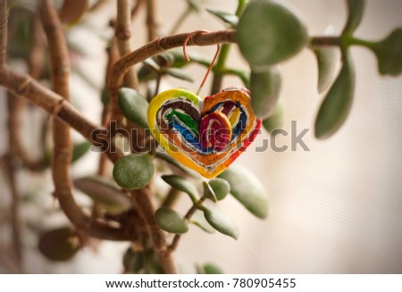 Vintage christmas handmade ornament heart from polymer clay. Colored polymer clay heart