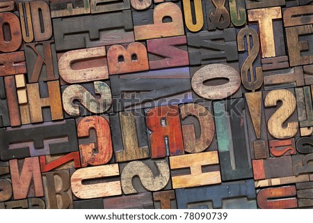 antique letterpress printing blocks with color ink patina, random collection of different size and style Royalty-Free Stock Photo #78090739