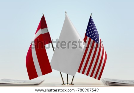 Flags of Denmark and USA with a white flag in the middle