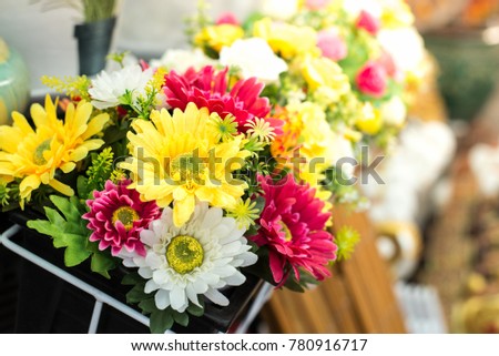 Background Fake flowers for decorating your home. Royalty-Free Stock Photo #780916717