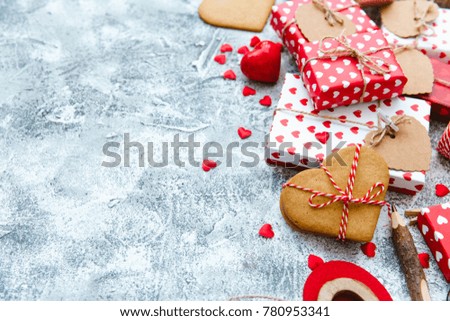 Valentines day gift boxes with heart shaped cookies and decorations. Holiday love background 
