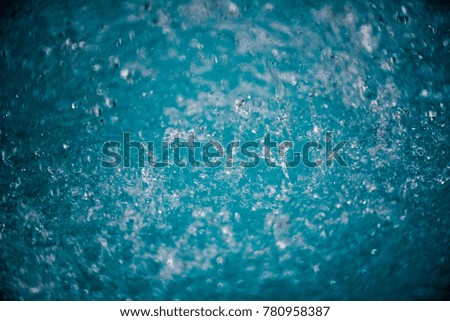 Beautiful blue water bokeh as an abstract background
