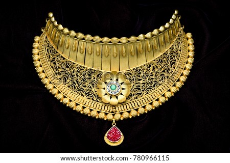 Pure 24 carat gold jewellery necklace Royalty-Free Stock Photo #780966115