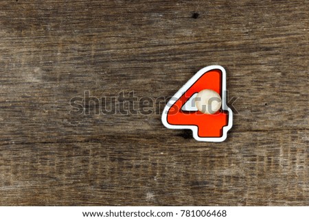 colorful Number 4  on old wooden  background