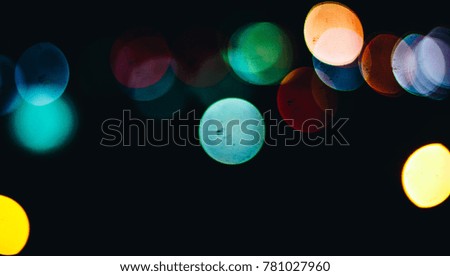 Colorful circles of bokeh light background ,blur background. Christmas and New Year seasonal.Celebration and bokeh lights background. 