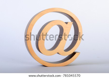 At sign as a sculpture on white background