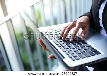 Close up nice hands of woman typing on the laptop with sunlight , Education or Business Concept