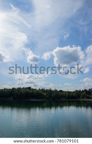 Lake in Woods. Pure lake in the forest. Beautiful sky. Reflection