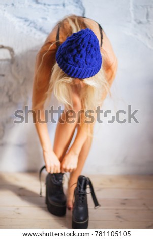 The girl wears shoes, Focus on the blue hat