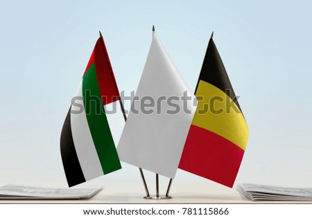 Flags of UAE and Belgium with a white flag in the middle