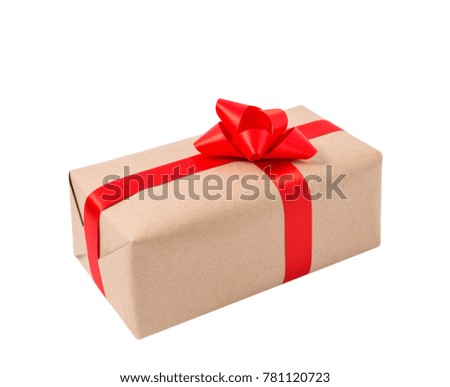 Gift box wrapped in brown recycled paper with red  bow isolated on white background.