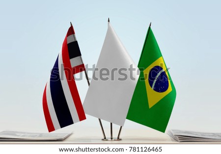 Flags of Thailand and Brazil with a white flag in the middle