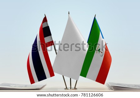 Flags of Thailand and Equatorial Guinea with a white flag in the middle