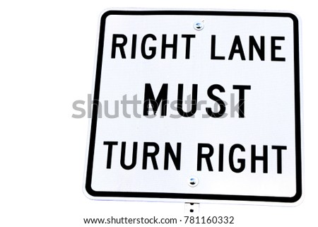 Close up on a "Right Lane Must Turn Right" at an intersection, in a transportation background.Signpost in public street, "Right Lane Must Turn Right"