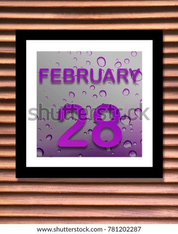 Calendar is  purple  February 28 with wood background, Can you use be copy space your text and design about activity, date, remember concept for Appointment.