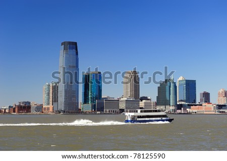 New Jersey Hoboken skyline panorama over Hudson River with skyscrapers and blue clear sky viewed from New York City Manhattan downtown.