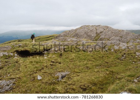 Hiker on a hill in Connemara - Ireland