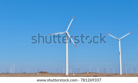Wind farm in the autumn in Bulgaria. The ecological way of energy production.wind turbines