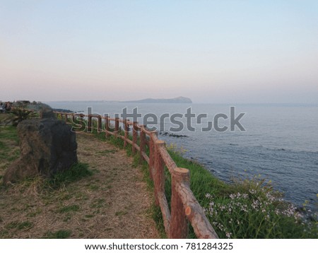 Seashore in Seongsan on Jeju Island, South Korea. View on Udo island in the horizon