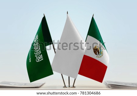 Flags of Saudi Arabia and Mexico with a white flag in the middle