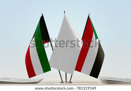 Flags of Kuwait and Sudan with a white flag in the middle