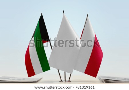 Flags of Kuwait and Poland with a white flag in the middle