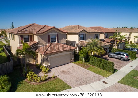 Aerial drone photo of single family homes in South Florida