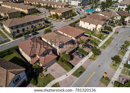 Aerial drone photo of two story single family homes in Doral FL USA
