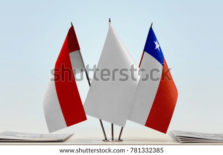 Flags of Indonesia and Chile with a white flag in the middle