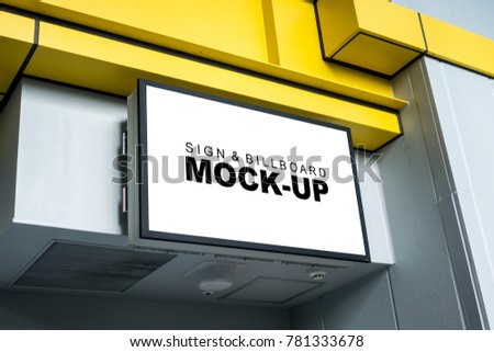 The mock up blank white screen of signboard lightbox placed on the wall of modern building for information or advertisement media on display with clipping path