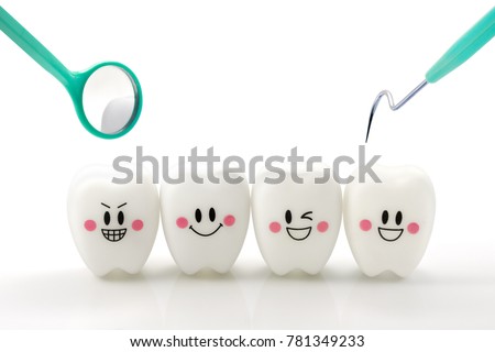 Teeth smile emotion with dental mirror and dental plaque cleaning tool isolated on white background, With clipping path Royalty-Free Stock Photo #781349233