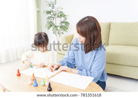 Mother and child making pictures