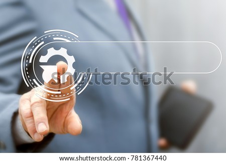 Integration Web Search Information Technology Template concept. Businessman using virtual modern touchscreen presses cogwheel arrow button. Integrate Internet Service. Royalty-Free Stock Photo #781367440