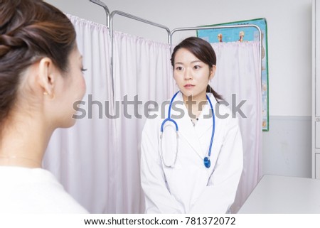 Doctor and nurse working at hospital