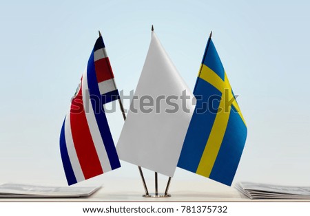 Flags of Costa Rica and Sweden with a white flag in the middle