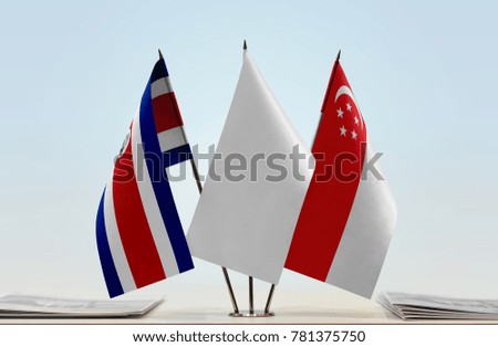 Flags of Costa Rica and Singapore with a white flag in the middle