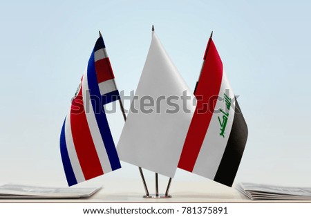 Flags of Costa Rica and Iraq with a white flag in the middle