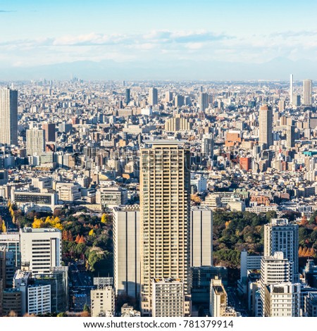 Asia Business concept for real estate and corporate construction - panoramic modern city skyline bird eye aerial view of Shinjuku district under sun and vivid blue sky in Roppongi Hill, Tokyo, Japan