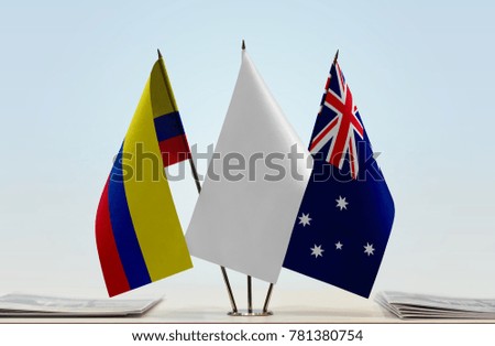 Flags of Colombia and Australia with a white flag in the middle
