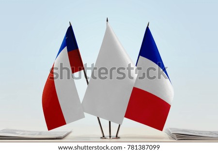 Flags of Chile and France with a white flag in the middle