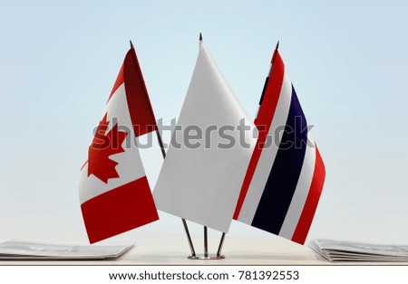 Flags of Canada and Thailand with a white flag in the middle
