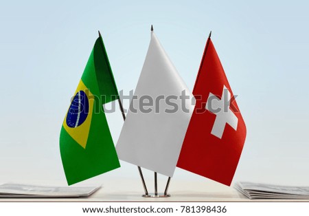 Flags of Brazil and Switzerland with a white flag in the middle