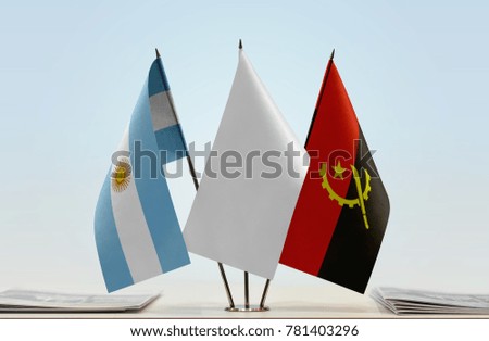 Flags of Argentina and Angola with a white flag in the middle