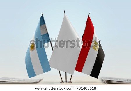 Flags of Argentina and Egypt with a white flag in the middle